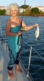 Mary fishing at anchor