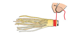 Replacing the skirt on a trolling lure (3)