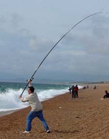 surf casting off Dorset's famous Chesil Beach.